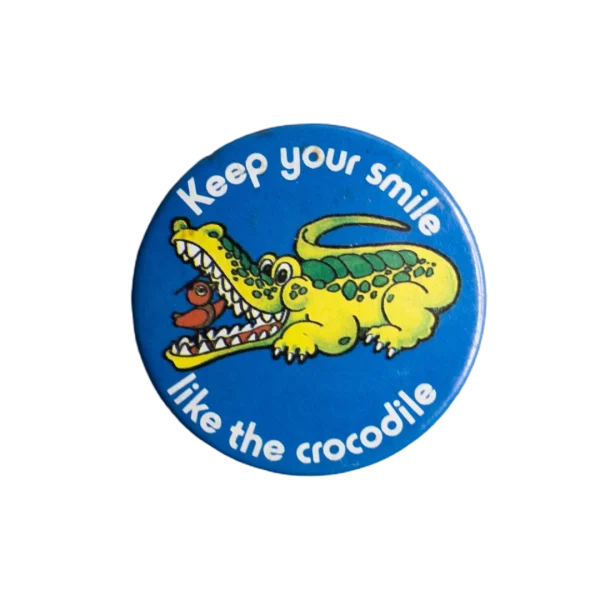 "Keep Your Smile Like The Crocodile" Pin Badge