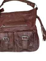 Genuine Leather Shoulder Bag with Front Buckle Pockets and Side Tassels - Image 2