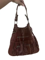 Genuine Leather Shoulder Bag with Front Buckle Pockets and Side Tassels - Image 3
